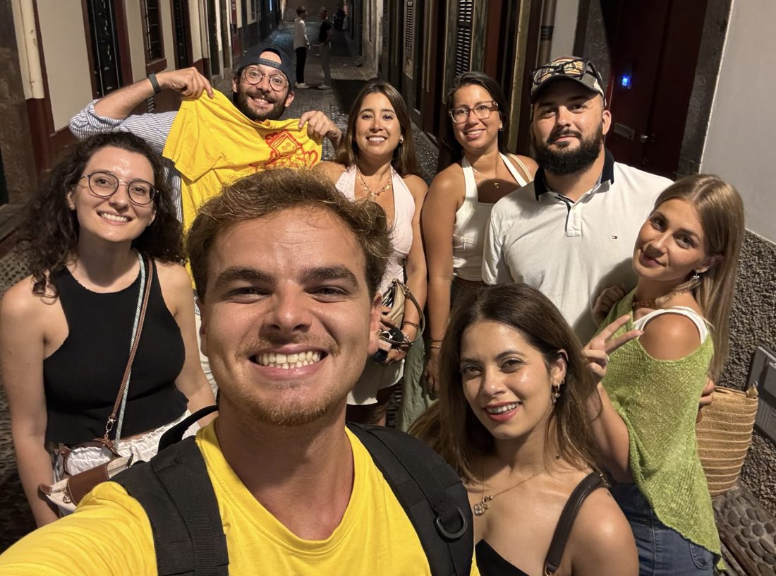 JJ with a happy group of guests on a night tour through the old streets of Funchal