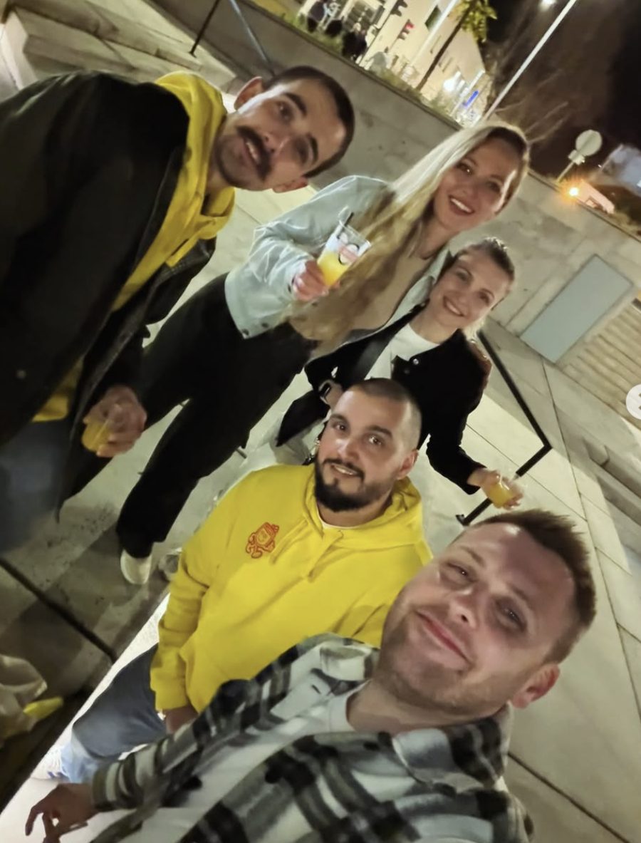 Marco on a night out in Funchal with guests, holding drinks