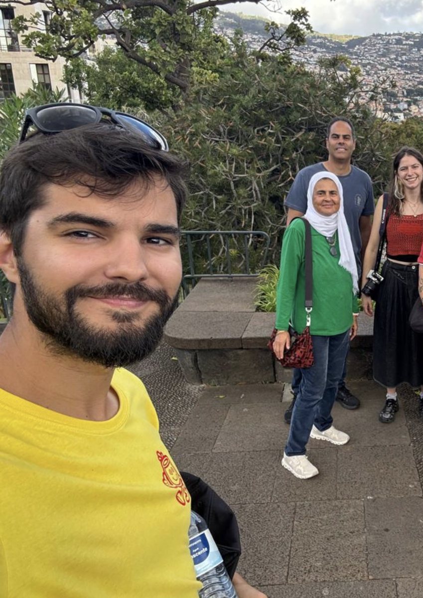 Tomás with a group of guests at a viewpoint above Funchal marina