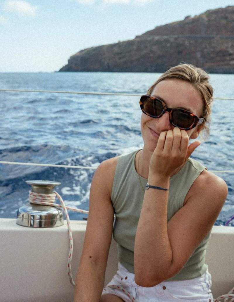 Guest relaxing on a private sailboat off the coast of Madeira