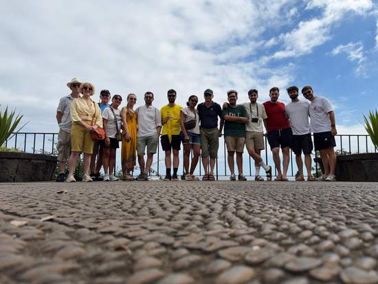Group lined up on a viewpoint terrace above Funchal